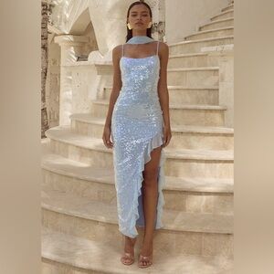 Light blue sequined dress with asymmetrical ruffled hem and scarf